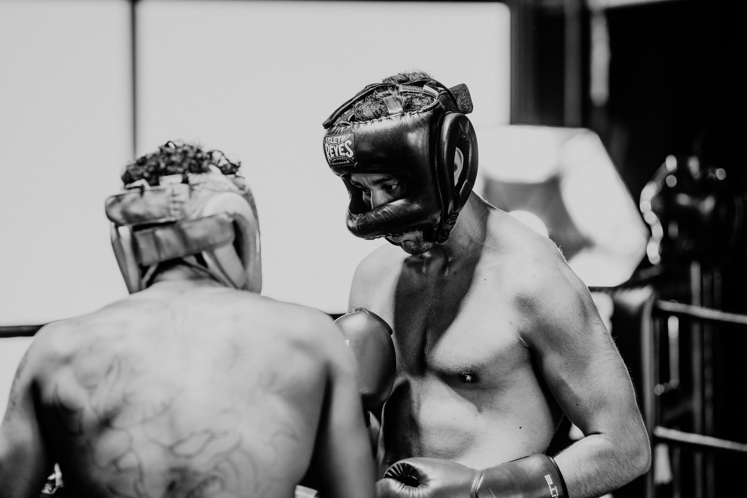 Black and white portrait of two boxers in a boxing ring, Guatemala City.